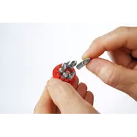 Screwdriver with bit magazine magnetic