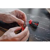 Screwdriver with bit magazine magnetic