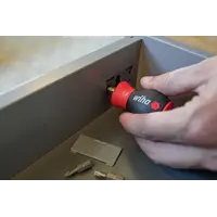 Screwdriver with bit magazine magnetic