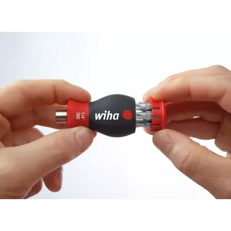 Screwdriver with bit magazine magnetic