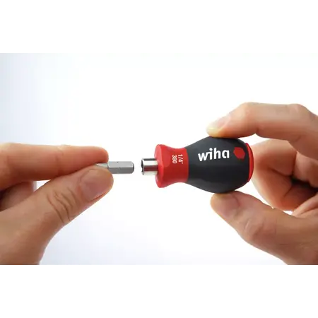 Screwdriver with bit magazine magnetic